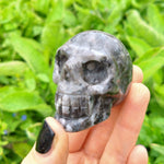 Load image into Gallery viewer, Astrophyllite Skull Carving
